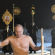 Russian President Vladimir Putin walks out of a hole in the ice after taking a dip in the freezing waters of Lake Seliger.